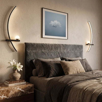 LED curved wall light installed on both sides of a bed, featuring slim arc-shaped lighting with warm ambient glow.