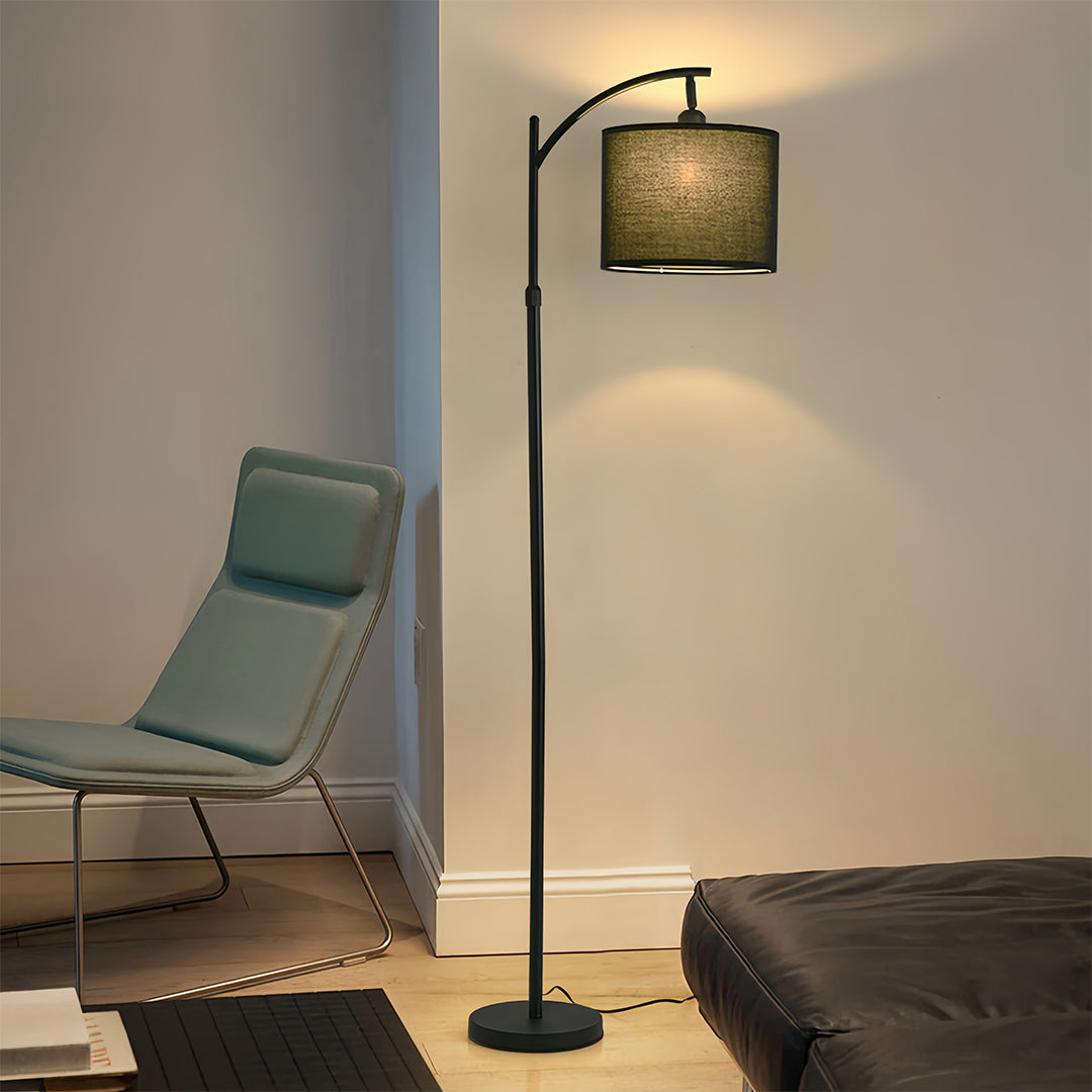 Elegant living room featuring small black pendant light with cream fabric shade creating cozy atmosphere