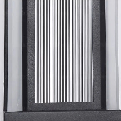 Modern outdoor wall sconce with textured black frame and ribbed glass diffuser