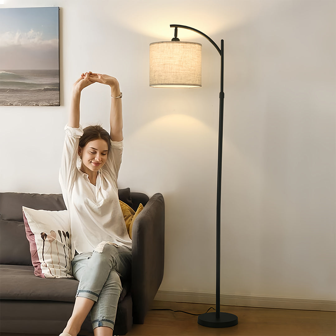 Contemporary home office featuring small black pendant light with fabric shade providing comfortable task lighting