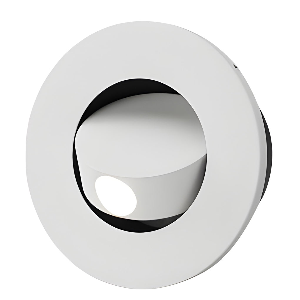 Round white recessed led reading lamp designed for minimalist interior spaces.