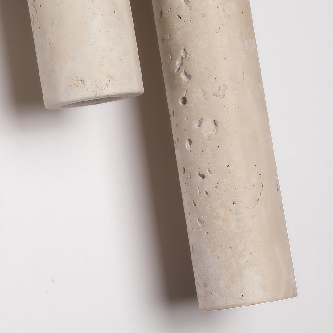 Stone wall lighting close-up showing natural stone texture and premium handcrafted cylindrical design.