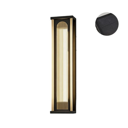 Vertical solar wall sconce with black metal housing and integrated solar panel
